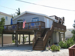 Immaculate Raised Ranch Style Home Located On The Bayside In Surf City